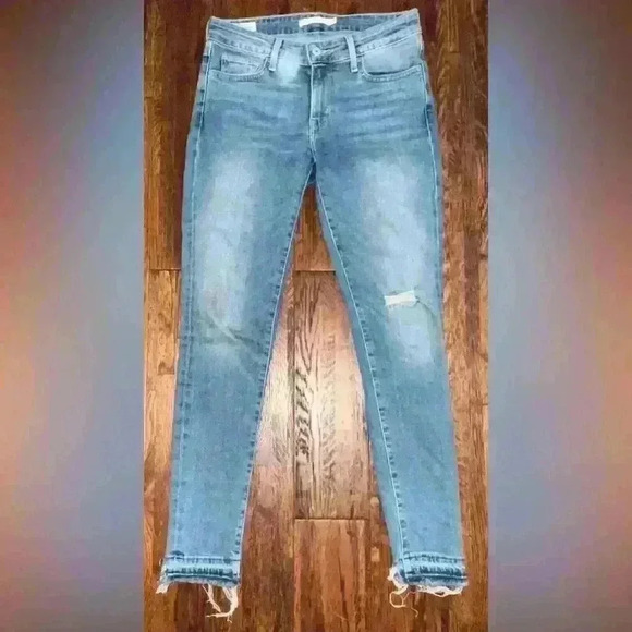LEVIS Premium 711 Mid Rise Skinny Jean with Raw Hem in Light Wash - Picture 1 of 13